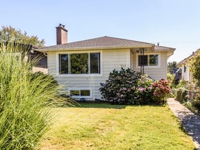 This updated two-storey house resides in East Vancouver's Fraser neighbourhood with transit, parks and shopping nearby.