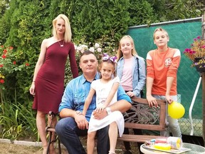 A community is rallying around the Savic family (left to right: mother Dragana, father Aleksandar, daughters Lana and Nikolina, son Vuc), after their vehicle was struck and flipped onto its roof in a devastating crash on Coquitlam's Brunette Avenue off-ramp last month.