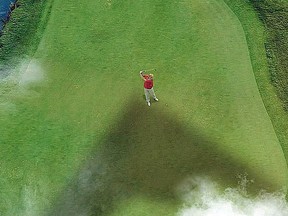 Kahemeni’s Twitter account posted a photo of a golfer — with a striking resemblance to Trump — with the shadow of a drone lurking above him.