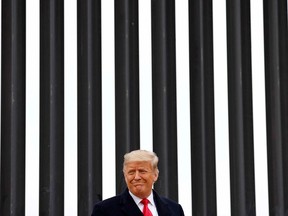 In his first appearance since the violence at the U.S. Capitol, President Donald Trump visits a section of the U.S.-Mexico border fencing in Texas on Jan. 12, 2021.