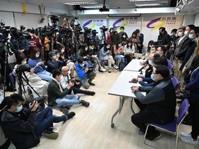 Civic Party members hold a news conference at party headquarters in Hong Kong on Jan.6 following the arrest of dozens of opposition figures under the National Security Law.