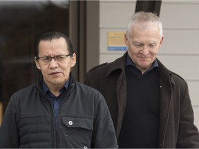 Wet'suwet'en hereditary leader Chief Woos, also known as Frank Alec, left, and B.C. Indigenous Relations Minister Scott Fraser arrive to address the media in Smithers, B.C., Sunday, March 1, 2020.