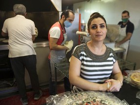 Shahnaz Oleh has been running Amir Bakery ever since her friend and her friend's daughter - Ayeshe Pourghaderi and Fatemah Pasavand -  were killed last year when the Iranian military mistakingly shot down a Ukrainian Airlines plane taking off from Tehran.