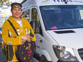 Knowledge keeper Wendall Williams outside the new Kilala Lelum Mobile Health Clinic van powered by Telus Health.