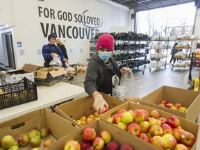 Communities of worship provide solace and tangible care, such as the food hampers given out by volunteers at the Broadway Church in Vancouver.