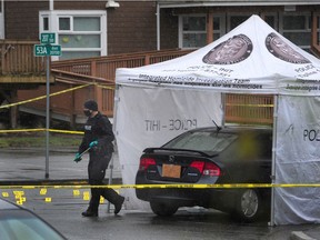 LANGLEY, January 27, 2021 -- RCMP and the Homicide Investigation Team (IHIT) on the scene of a fatal shooting at 207 St and 53A Ave in Langley, BC., on January 27, 2021. One person is dead and the suspect remains at large. A burnt out vehicle was found abandoned near by.

(NICK PROCAYLO/PNG) 



00063618B ORG XMIT: 00063618B [PNG Merlin Archive]