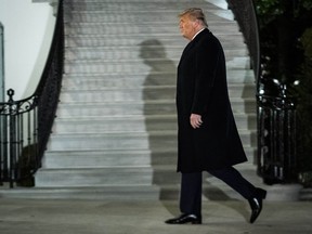 President Donald Trump returns to the White House on Tuesday, Jan. 12, 2021.