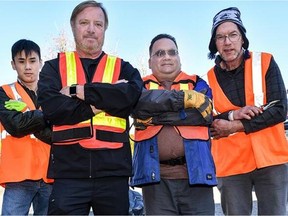 Don Matthews, second from left, a team leader for 27 years, and a mobile work crew for the Fraserside Community Services Centre.