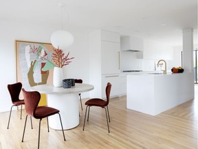 Peter Wilds, of Peter Wilds Design, transformed a dark, dated kitchen in this Mount Pleasant home. He opened it up to create an open-concept environment with a fresh, light palette. The cool, contemporary design sets the stage for artwork by Rubeena Ratcliffe.