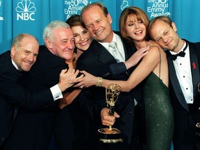In this file photo taken on September 13, 1998 the cast of "Frasier" pose with their Emmy for Outstanding Comedy Series at the 50th Annual Primetime Emmy Awards in Los Angeles.