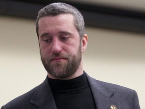 Dustin Diamond leaves a courtroom after attending further proceedings at Ozaukee County Courthouse in Port Washington, Wis., Feb. 19, 2015.