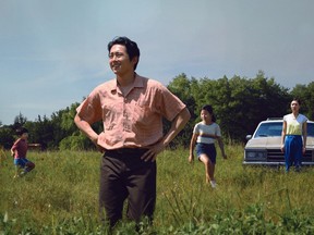 Steven Yeun (centre) with Alan S. Kim, Noel Cho and Yeri Han in Minari.