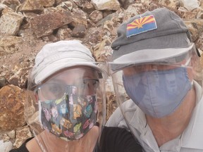 Snowbirds Ray and Joanne Moschuk of Parksville, seen here wearing masks and shields in a selfie in Scottdale, Ariz., said they should be exempt from the mandatory-minimum, three day quarantine at a government-mandated hotel when they return to Canada.