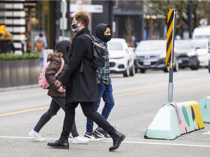  People wearing masks in downtown Vancouver.