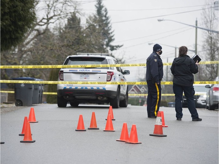  RCMP at the scene of a fatal shooting at 139A Street and 108th Avenue in Surrey on Thursday.