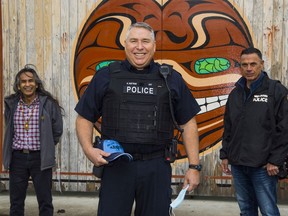 Metro Transit police Indigenous liaison officer Kirk Rattray, flanked by Norm Leech (left) of Vancouver’s Aboriginal Policing Centre and Vancouver police Cst. Rick Lavallee (right), says ‘I would encourage kids just to come and try out’ the new Blue Eagle Community Cadet program.
