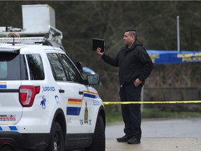Scenes from a fatal shooting in the 6500 block Portland St. in Burnaby, BC., on February 4, 2021. Police say the shooting took place at around 8:00pm on Wednesday.  A man in his 30s has been shot and killed in what the police believe was a targeted hit.