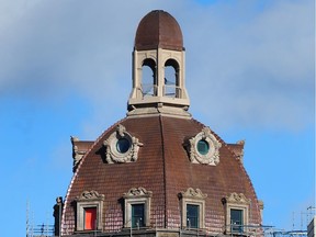 The Sun Tower, which is mostly behind scaffolding as it gets a facelift, has a new copper-clad dome.