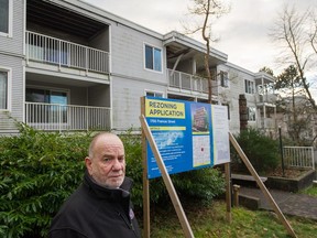 David Eddy in front of a building that was wrecked in a fire but is still standing. A First Nations' housing development was approved by city council in Vancouver on Feb. 16.