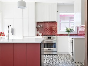 Dramatic black-and-white ceramic tiles anchor the space, but are also easy to clean.