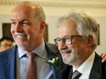 Premier John Horgan and his chief of staff, Geoff Meggs, two parts of the trio the Liberals dubbed the Budgetary Blues Brothers.
