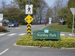 Park rangers regularly walk through Stanley Park to look for people who are living in tents and temporary structures.