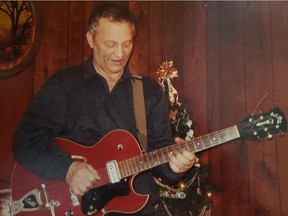 Michael Vecchio plays his vintage cherry-wood Guild Starfire guitar in 2014. ‘He’d look at that guitar and say, ‘Hey, I remember that!’ ’ his daughter Connie says of her father, who has dementia.