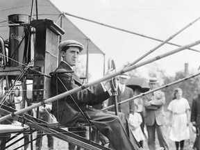 The aviator Charles K. Hamilton (1885-1914), a daredevil pilot, sitting at the controls of an early Curtiss Reims Racer biplane while smoking a cigarette. Hamilton made the first flight in the Vancouver area at Minoru Park in Richmond on March 25, 1910. Getty Images