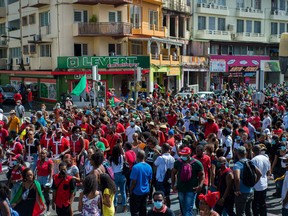 Several thousand people demonstrate in Fort-de-France, Martinique, on Feb. 27, 2021 against the government's lack of care over the after-effects of chlordecone, an insecticide accused of having poisoned the French West Indies island.