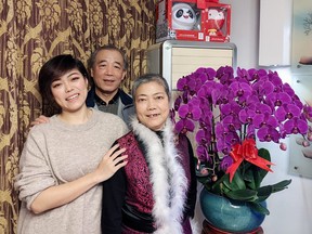 Jialing Zhang, left, with her parents in Beijing.