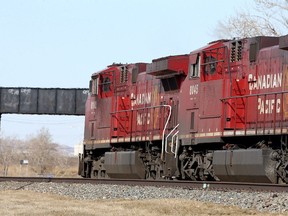A train is seen along the tracks in Ogden. Canadian Pacific Railway has agreed to buy Kansas City Southern for US$25 billion. Sunday, March 21, 2021.