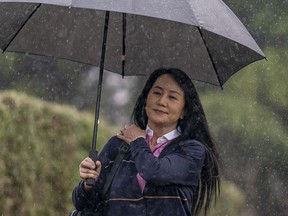 Huawei chief financial officer Meng Wanzhou leaves her home in Vancouver on Wednesday, March 24, 2021, to go to B.C. Supreme Court.