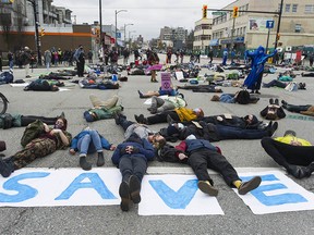 Protesters with Extinction Rebellion shut down the Cambie Street Bridge on March 27, 2021.
