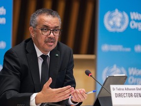 This handout picture taken and released on Feb. 12, 2021 by World Health Organization shows WHO Director-General Tedros Adhanom Ghebreyesus delivering remarks during a press conference in Geneva.