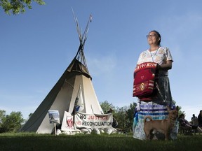 Debbie Baptiste, mother of the late Colten Boushie, stands in the protest camp on the grounds of the Legislative Building in Regina.