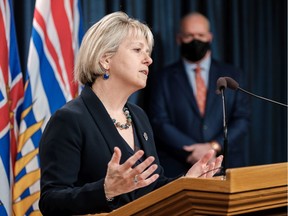 Chief provincial health officer Dr. Bonnie Henry and B.C. premier John Horgan announced new COVID-19 restrictions in B.C. on March 29, 2021.