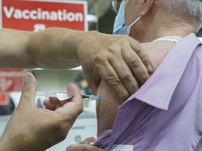 Seniors receive their COVID-19 vaccine.