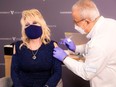 Singer Dolly Parton receives a vaccination against the coronavirus disease (COVID-19) at Vanderbilt University Medical Center in Nashville, Tennessee, U.S. March 2, 2021.