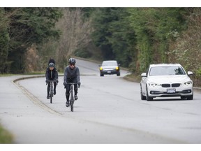 Cyclists in Stanley Park March 4, 2021.