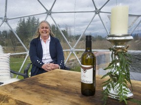 Debbie Etsell, owner of the Singletree Winery in Abbotsford, inside one of her dining bubbles, called Di Vine Domes, at the winery March 19.