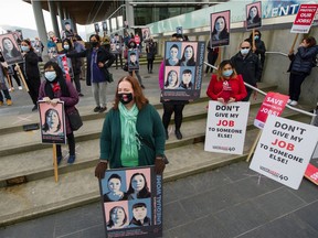 Unite Here Local 40 marks International Women's Day with a news conference and rally to highlight the impact of pandemic firings on female hotel workers - March 8, 2021

Photo by Arlen Redekop / Vancouver Sun / The Province News (PNG) (story by reporter) [PNG Merlin Archive]