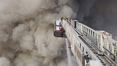 Photos of a structural fire at the Masonic Temple on Tuesday, March 30, 2021 at 1140 Lonsdale Avenue, North Vancouver.