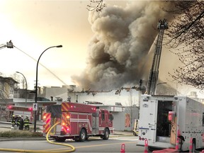 North Vancouver Fire Department battle a fire at the Duke of Connaught Lodge No. 64, also called the North Vancouver Masonic Centre, in a heritage building located at 1142 Lonsdale Ave. on March 30, 2021.