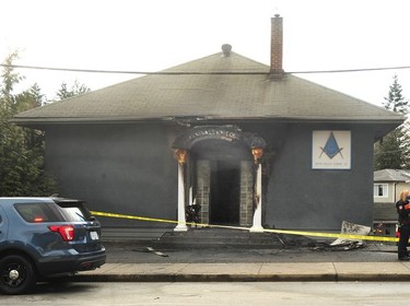 Firefighters on the scene of a fire at the Masonic Lodge at 1371 Lynn Valley Rd. in North Vancouver, BC., on March 30, 2021.