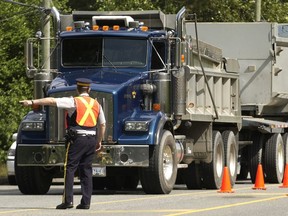 File photo: Police pull over a truck during an enforcement blitz.