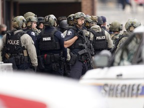 Police outside a King Soopers grocery store where a shooting took place Monday, March 22, 2021, in Boulder, Colo.