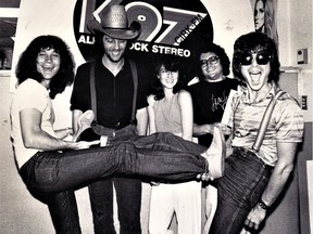 Doug Pringle with members of the Vancouver group Prism at Edmonton radio station K97 in 1979.