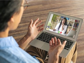 FILE PHOTO: A man video calls with a health professional. B.C. has introduced legislation that would allow people to get independent advice about their rights after they've been involuntarily detained for treatment of a severe mental health disorder. The service will be primarily virtual, using video conferencing and phones.