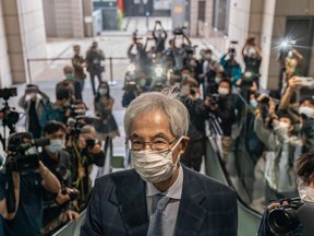 Former lawmaker and barrister Martin Lee arrives at West Kowloon court ahead of a sentencing hearing on April 16 in Hong Kong. Seven prominent democratic figures, including Lee, Apple Daily founder Jimmy Lai, and Margaret Ng, were convicted of unauthorized assembly.