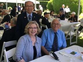 Mary Polak with her dad Ernest "Pete" Inkman, at the Korean consulate residence, commemorating the Korean War.